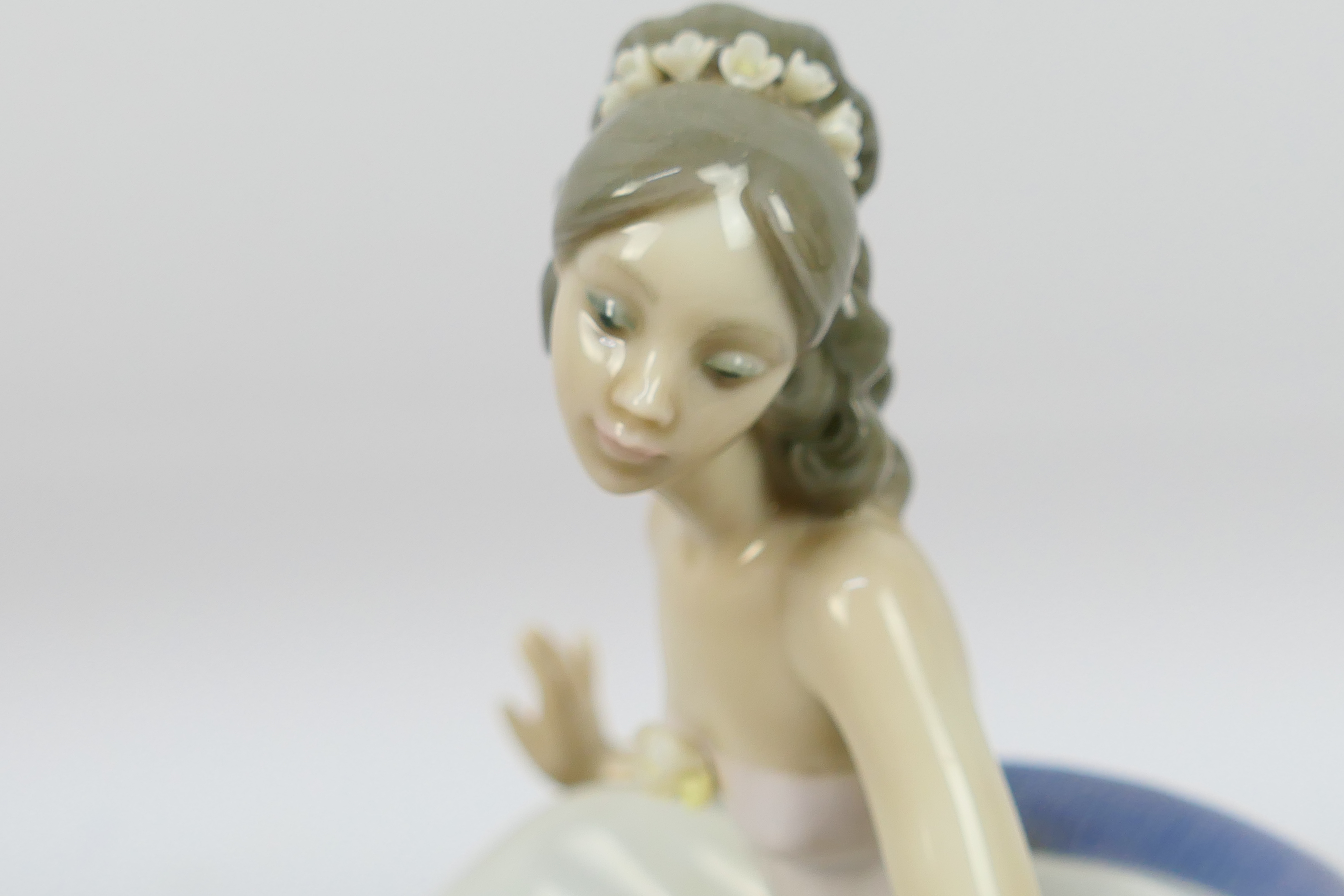 Lladro - A boxed figure entitled At The Ball, # 5859, approximately 15 cm (h). - Image 6 of 7