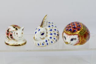 Royal Crown Derby - Three paperweights comprising a Collectors Guild Exclusive Orchard Hedgehog,