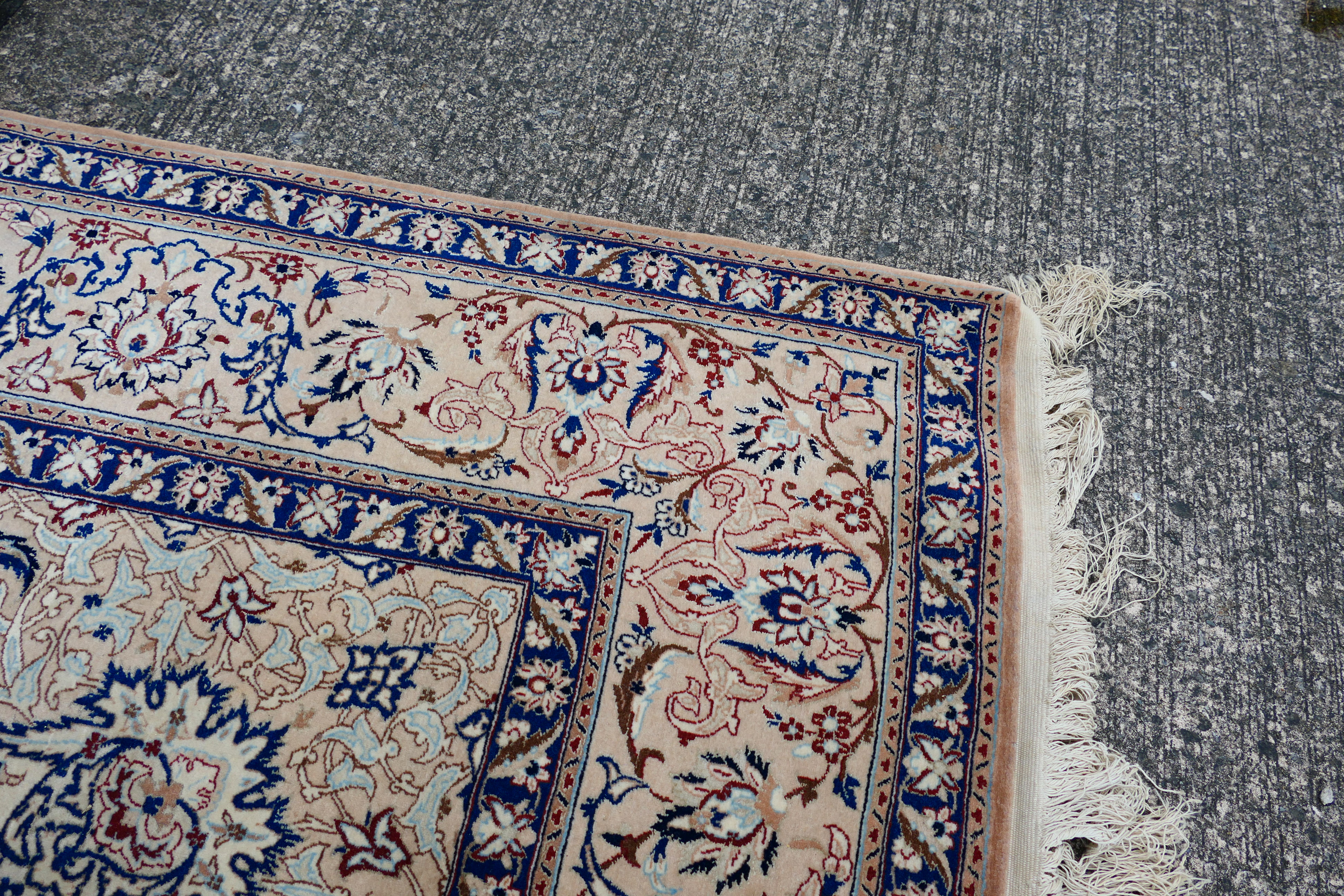 A Persian ivory ground rug with central medallion on a floral field, with foliage scroll border, - Image 13 of 14