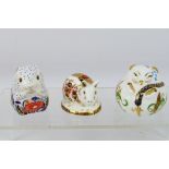 Royal Crown Derby - Three paperweights comprising a Collectors Guild Exclusive Poppy Mouse,