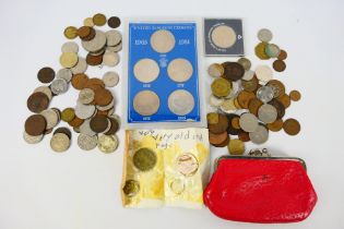 A collection of UK and foreign coins with a small quantity with silver content noted.