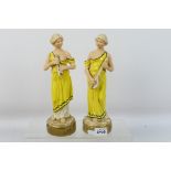 A pair of Royal Dux Classical lady figures, impressed to the base 2458 and 2459, approximately 24.