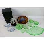 An Art Deco style green glass dressing table set,
