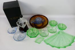 An Art Deco style green glass dressing table set,
