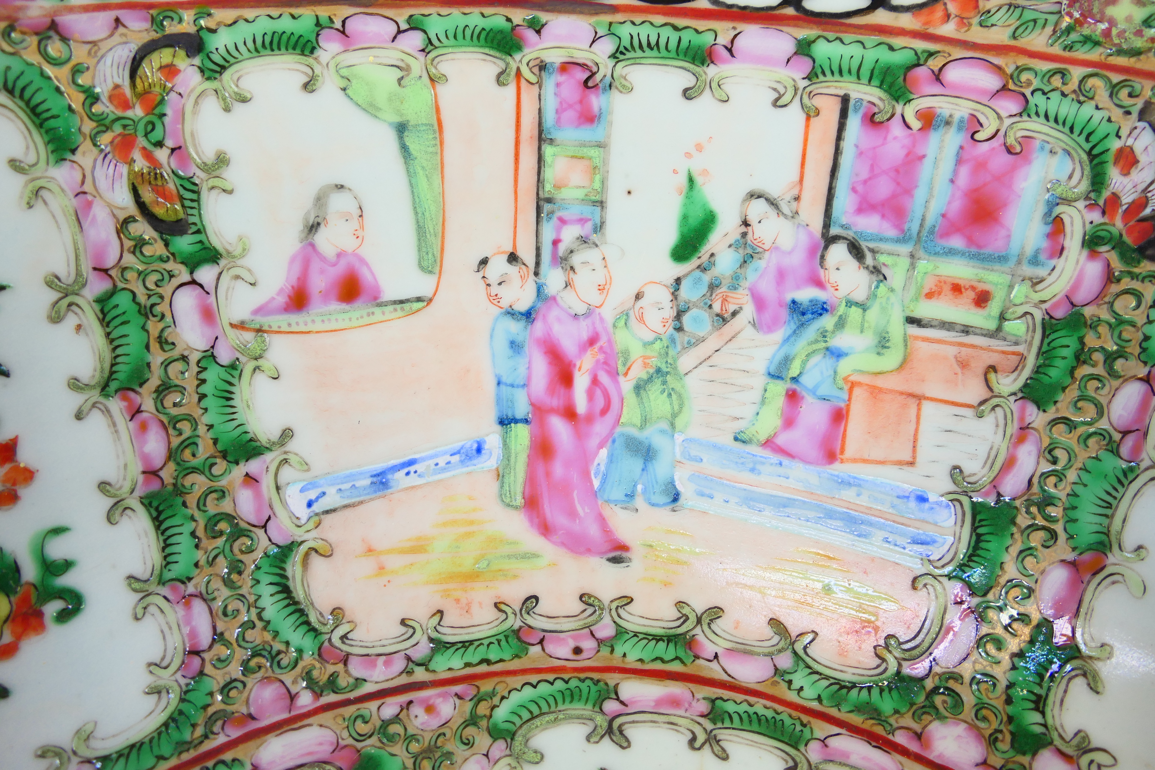 A large Cantonese famille rose punch bowl, typically decorated with panels of figures and flora, - Image 6 of 9