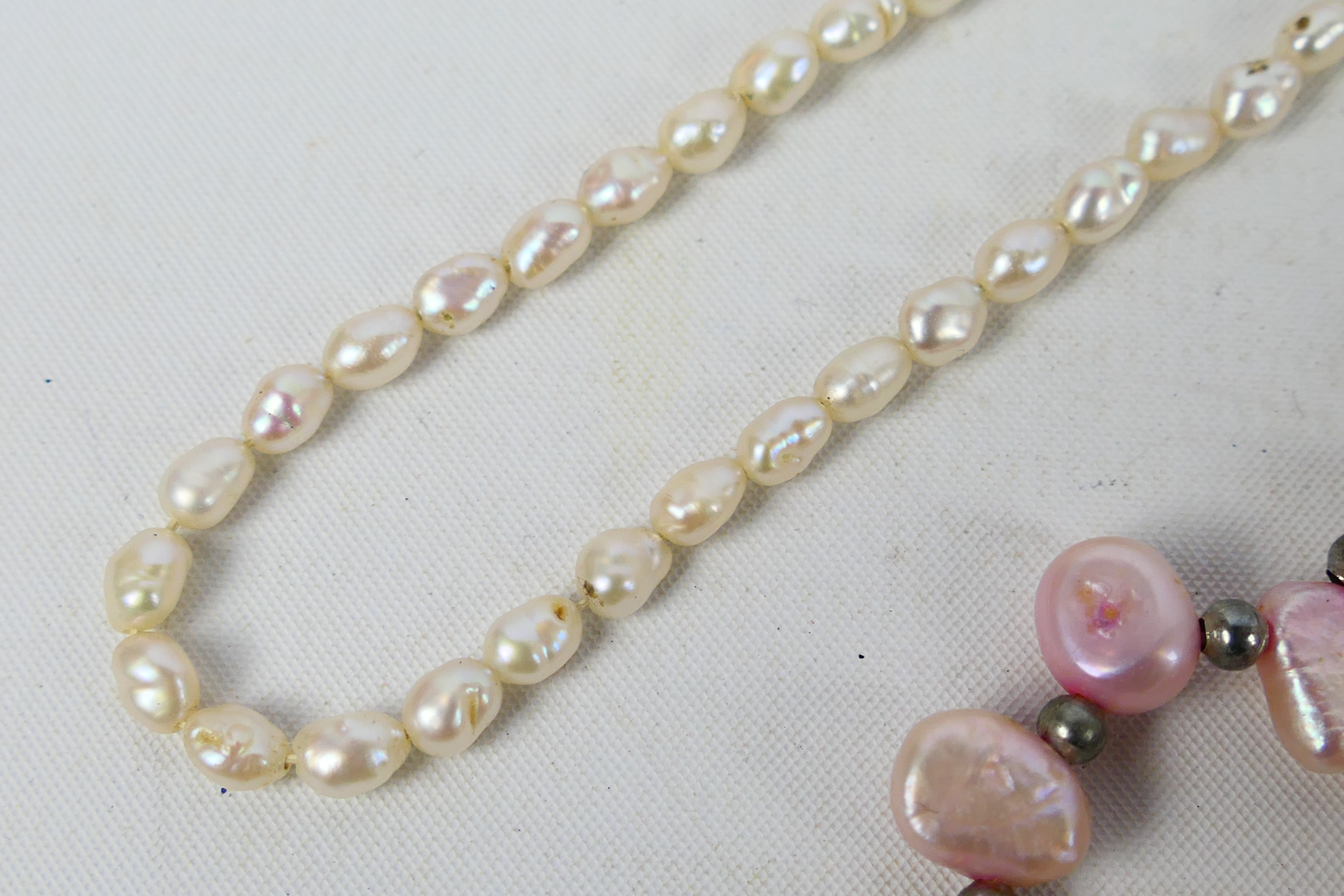 A rice pearl necklace with clasp stamped 9ct (in need of restringing) and a pearl bead three strand - Image 2 of 6