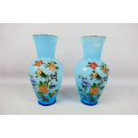 A pair of glass vases with floral decoration, approximately 28 cm (h). [2].