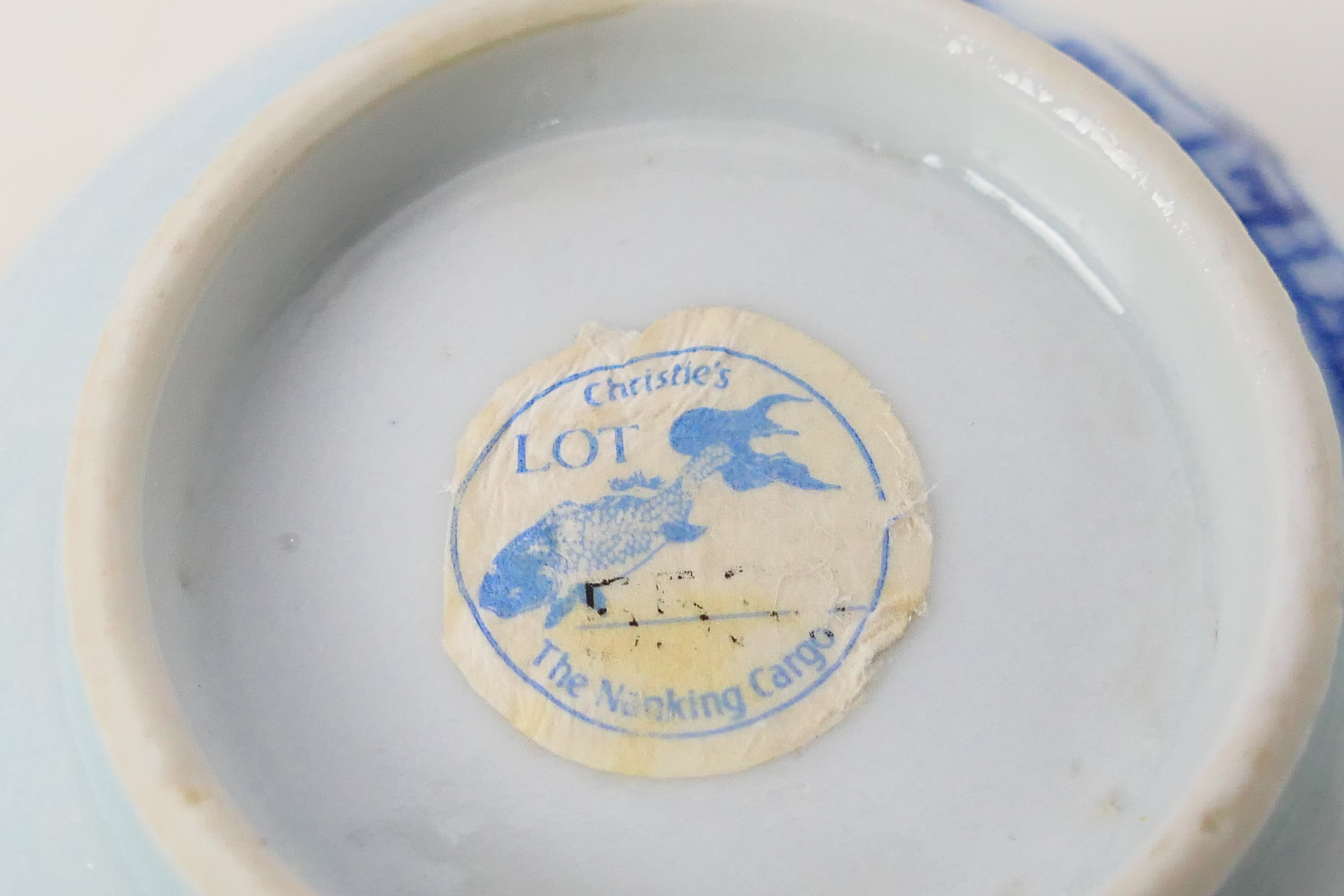 Nanking Cargo - A Qing dynasty blue and white tea bowl and saucer decorated with pine trees, c. - Image 9 of 9