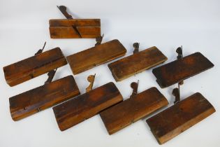 Nine antique moulding planes to include John Moseley & Sons.