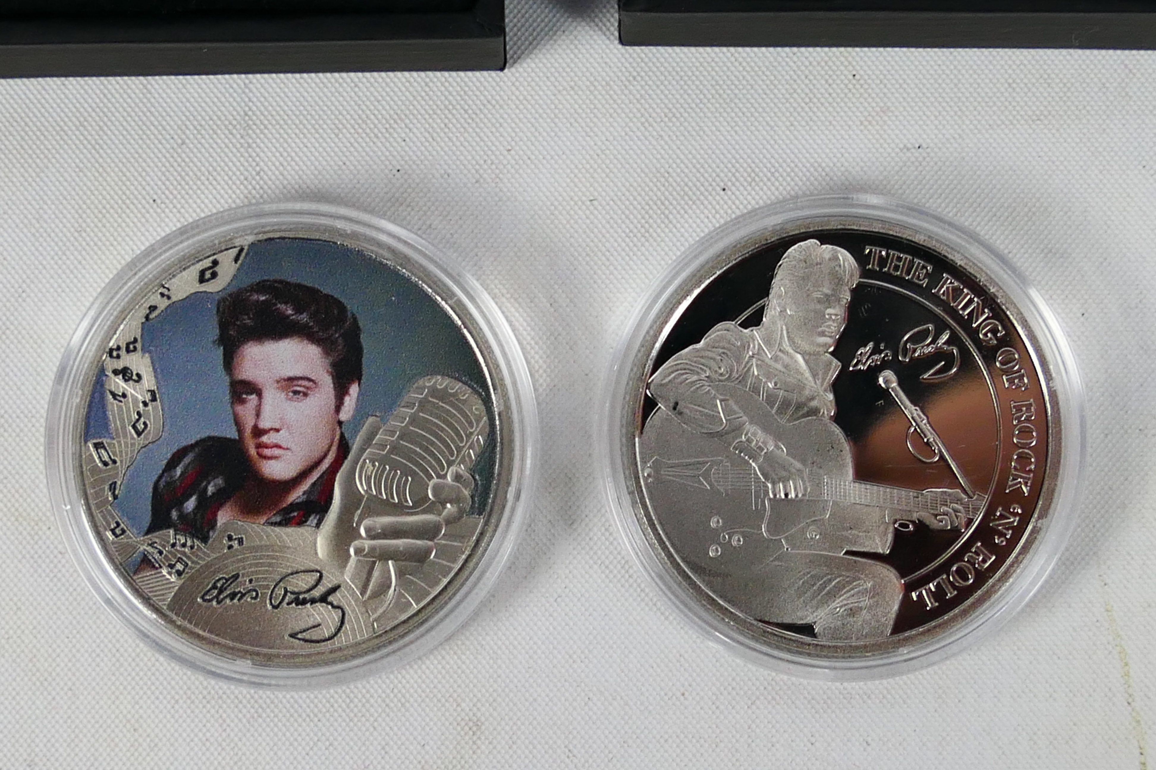 Elvis Presley - Four Elvis related commemorative coins comprising a 1/10 oz 24ct gold proof Blue - Image 4 of 6