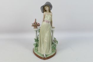 A large Lladro figure, # 5378, Time For Reflection,