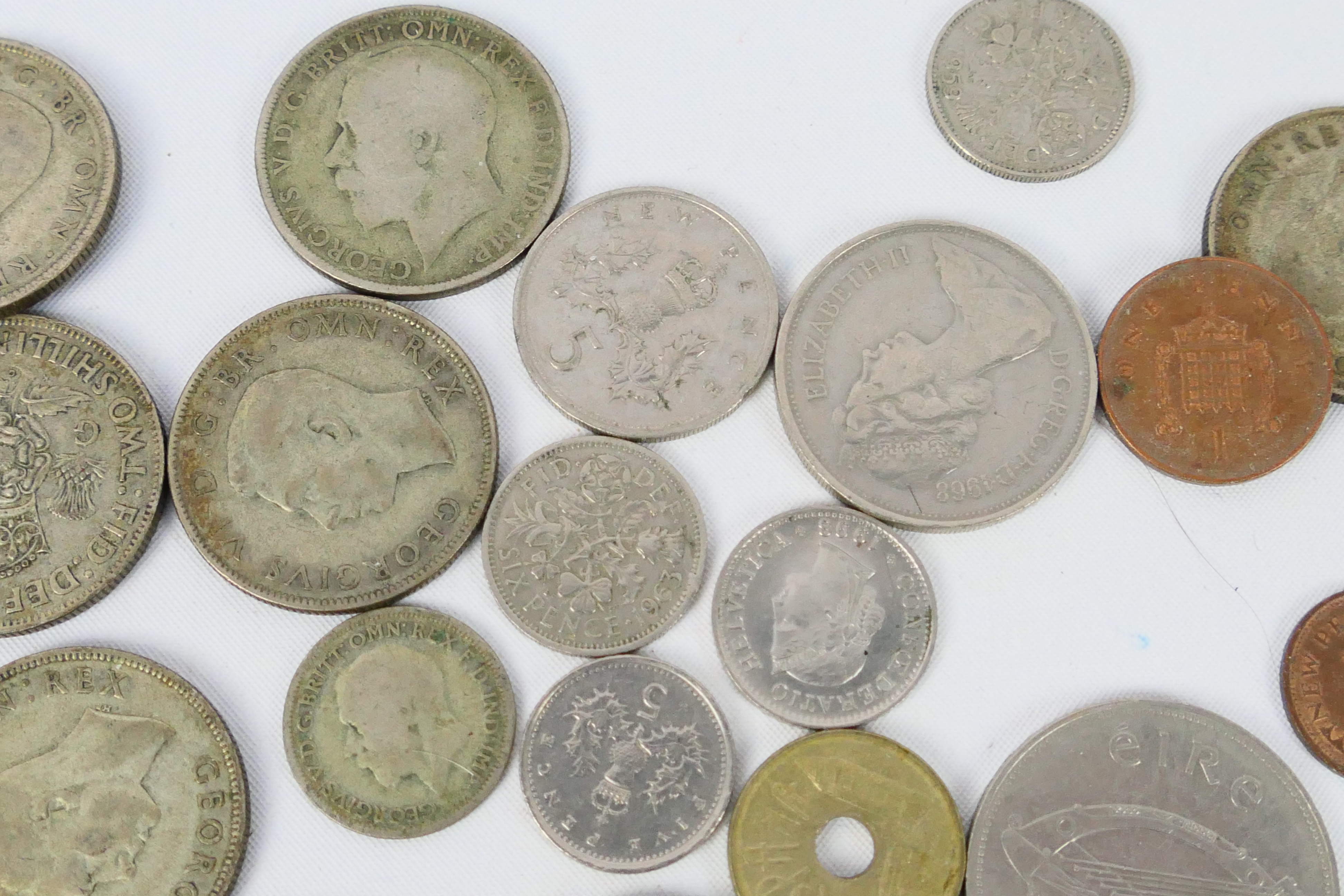 A small quantity of UK and foreign coins, some silver content. - Image 5 of 6