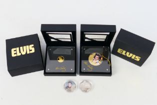 Elvis Presley - Four Elvis related commemorative coins comprising a 1/10 oz 24ct gold proof Blue
