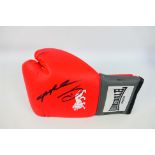 Boxing Interest - A red Lonsdale boxing glove signed by Sugar Ray Leonard (Ray Charles Leonard)