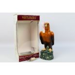 Whyte & Mackay - A ceramic Royal Doulton decanter in the form of a Golden Eagle from the Scottish