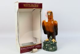 Whyte & Mackay - A ceramic Royal Doulton decanter in the form of a Golden Eagle from the Scottish