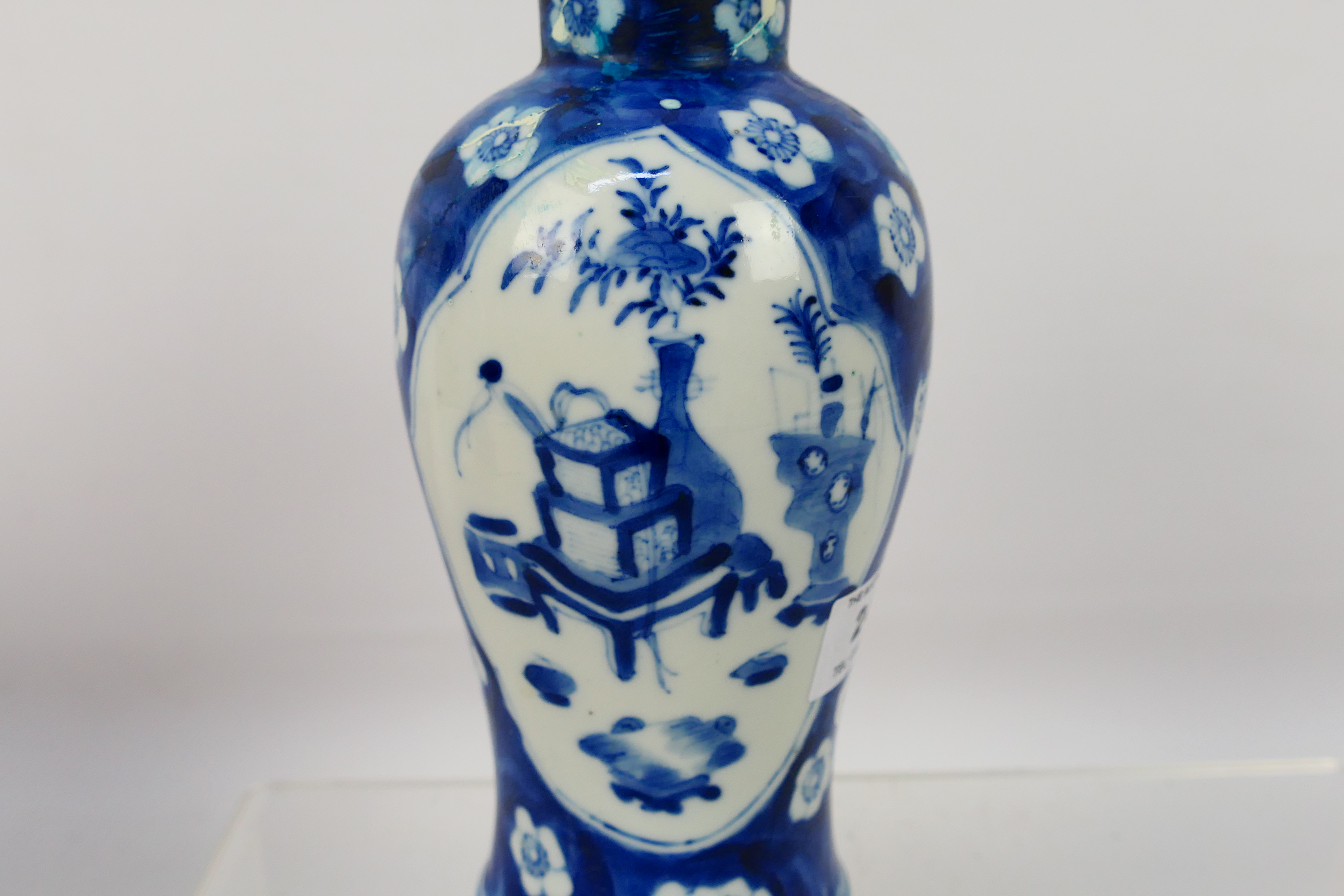 A Chinese blue and white jar and cover, decorated with prunus, - Image 17 of 23