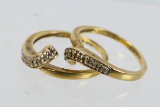 A pair of 9ct yellow gold rings set with diamond chips, size O, approximately 4.9 grams.