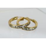 A pair of 9ct yellow gold, stone set ear hoops, approximately 3.7 grams.