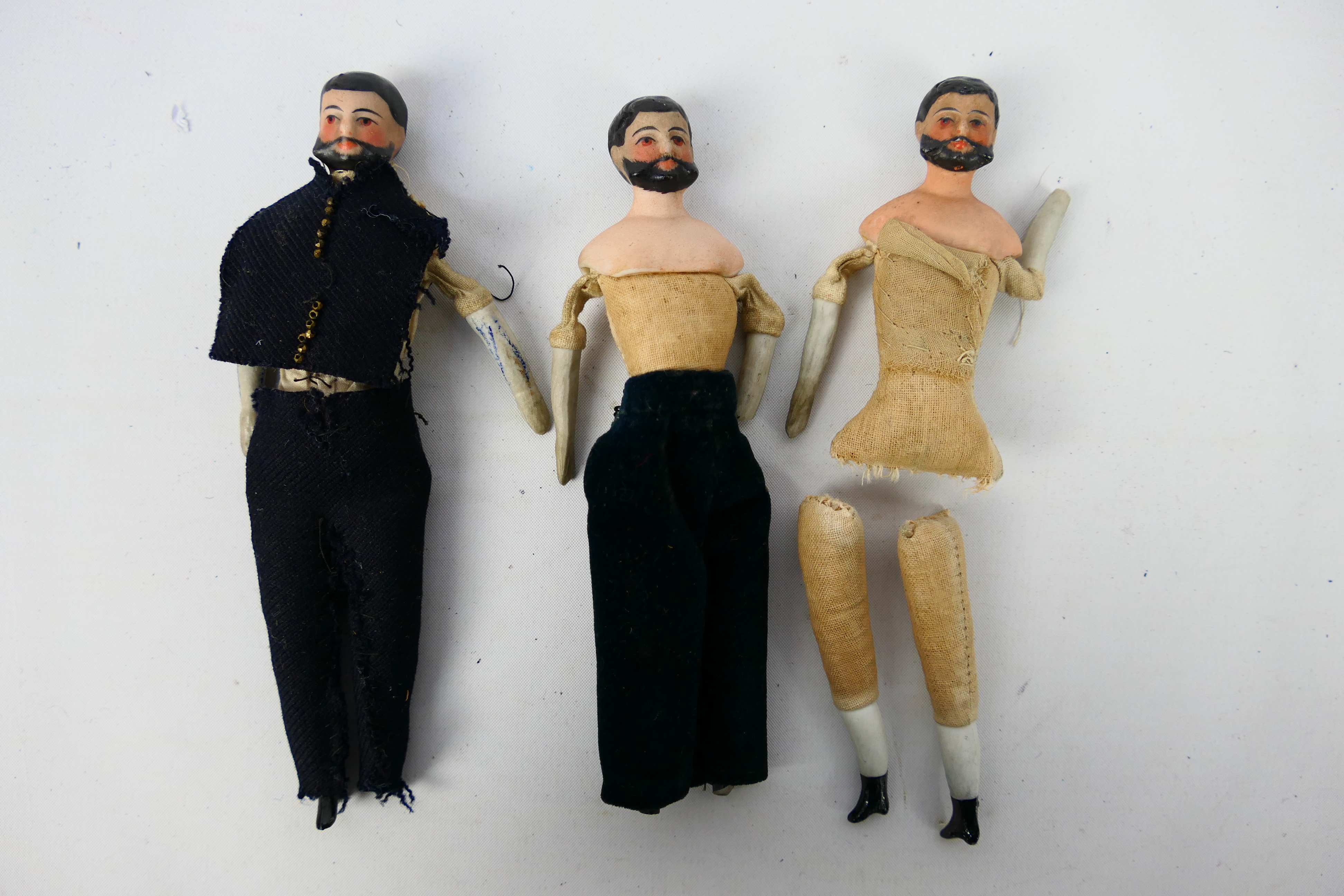 Bisque Male Dolls - 3 x bearded dolls with bisque heads, shoulders and lower limbs and cloth bodies.