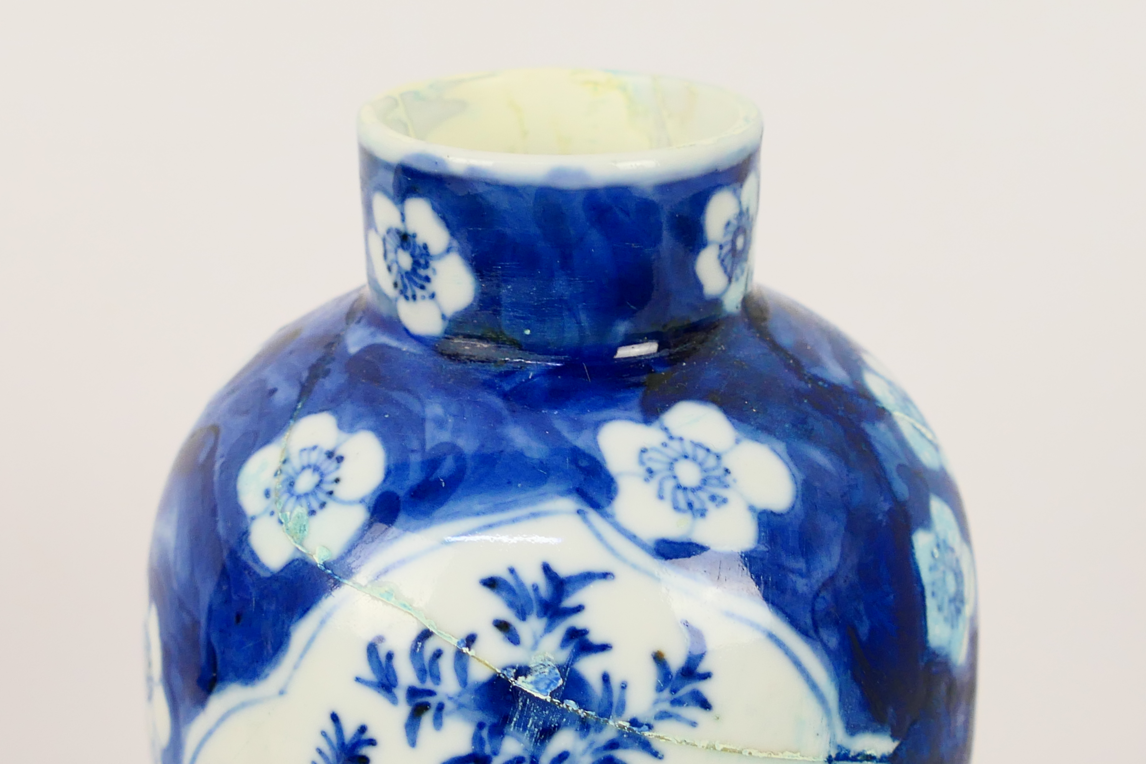 A Chinese blue and white jar and cover, decorated with prunus, - Image 13 of 23