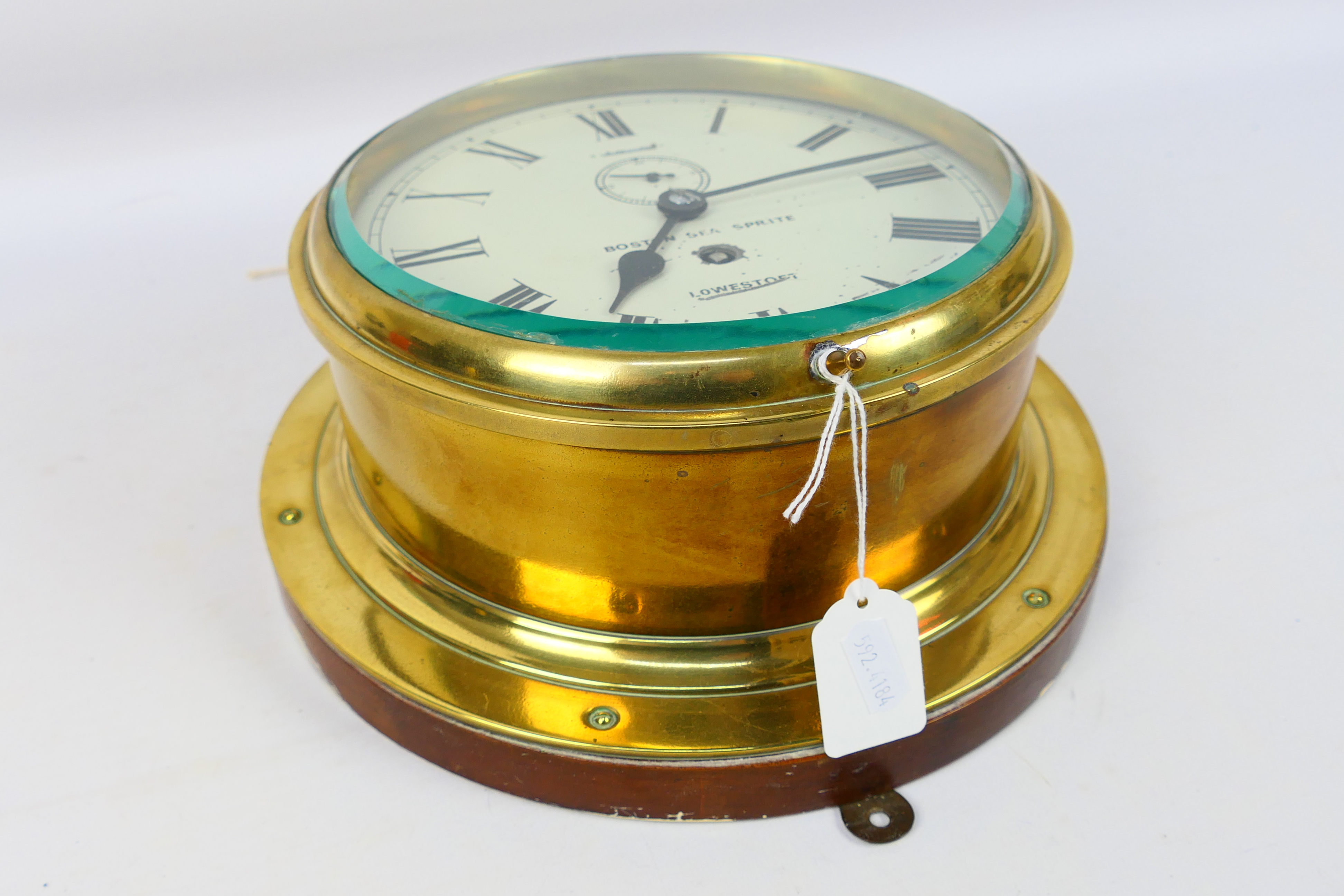 A brass-cased ships bulkhead clock, - Image 4 of 7