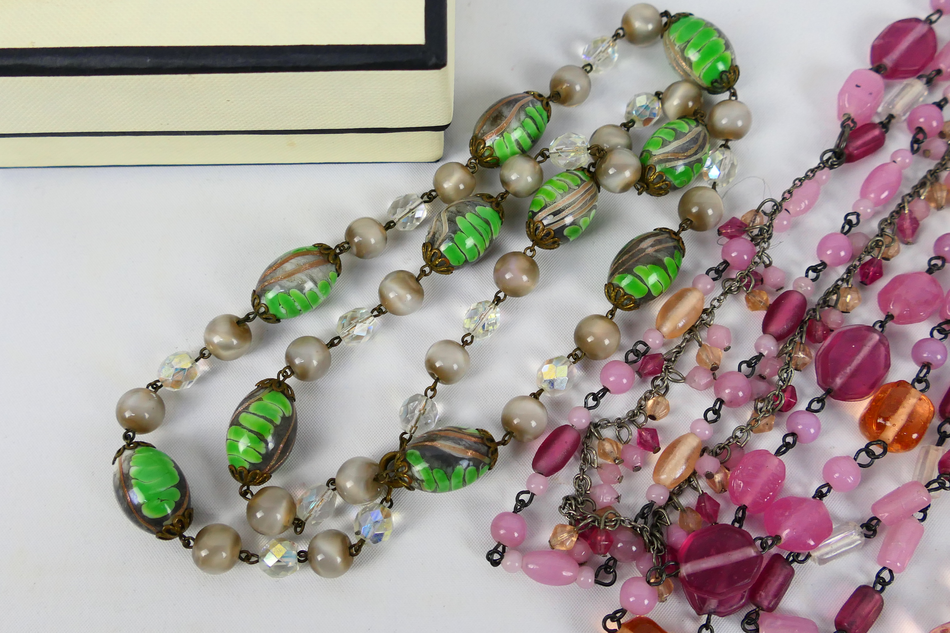 Three decorative costume jewellery necklaces and a pair of earrings. - Image 2 of 6