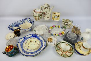 A mixed lot of ceramics to include Wedgwood, Royal Doulton, Spode, Wade and other,