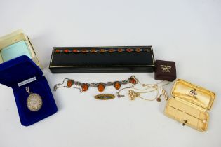 Lot to include a yellow metal stick pin, stamped 375, a 9ct gold stone set pendant,