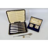 Silver Group - Lot to include a set of six silver handled butter knives contained in case,