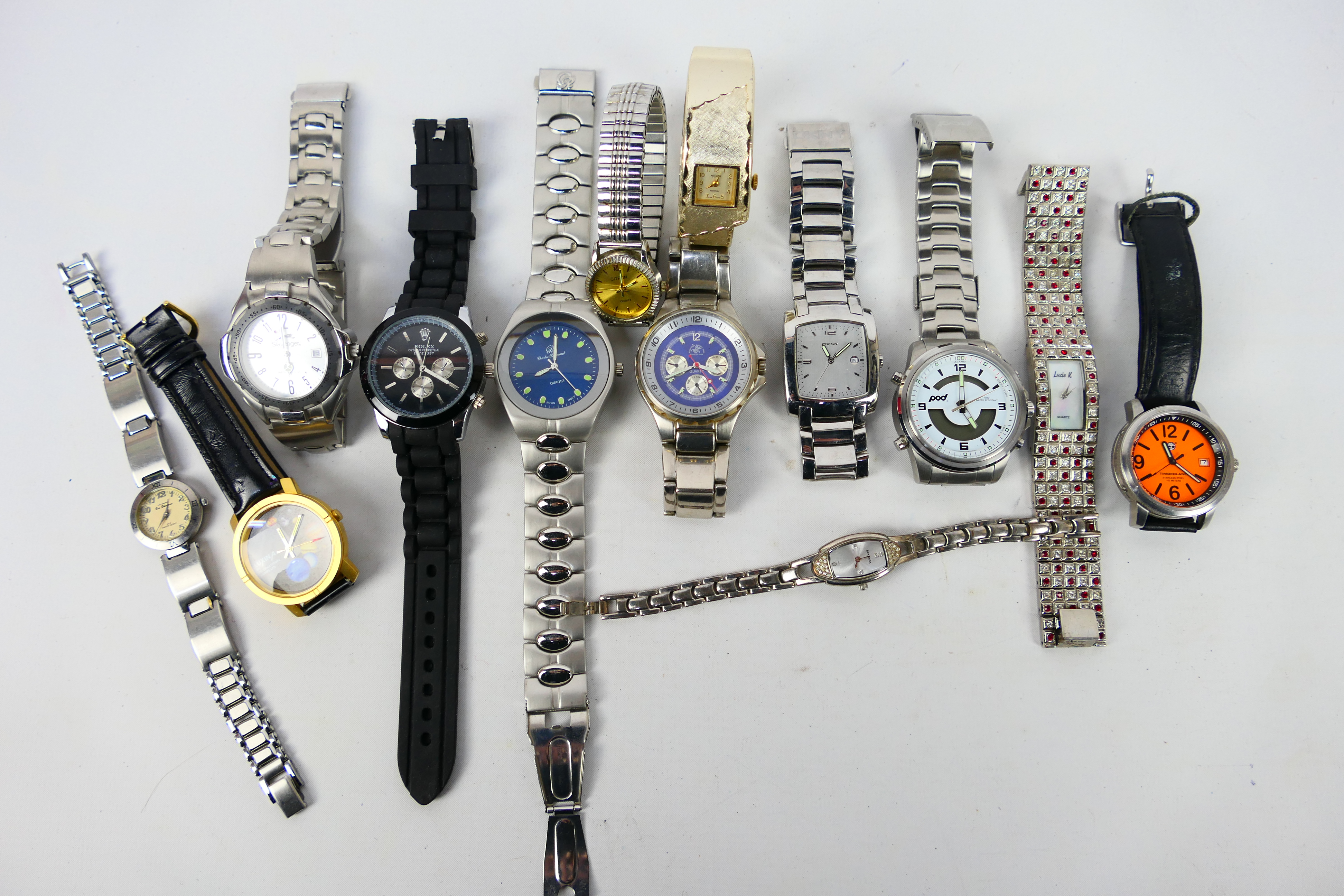 A collection of various wrist watches to include DKNY, Slazenger, Citron, Ben Sherman and other.