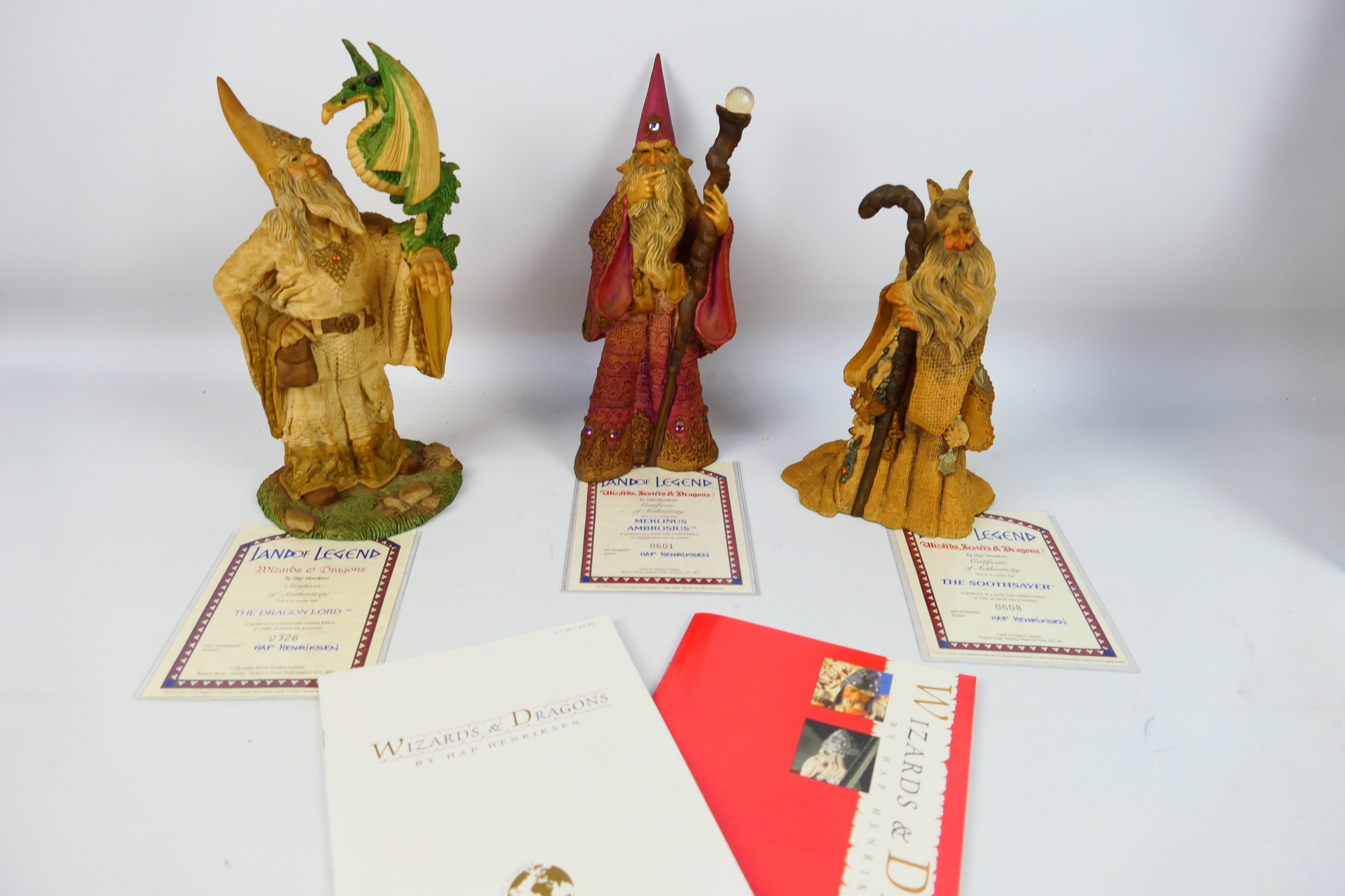 Three boxed limited edition Lilliput Lane Land Of Legend / Wizards & Dragons fantasy figures