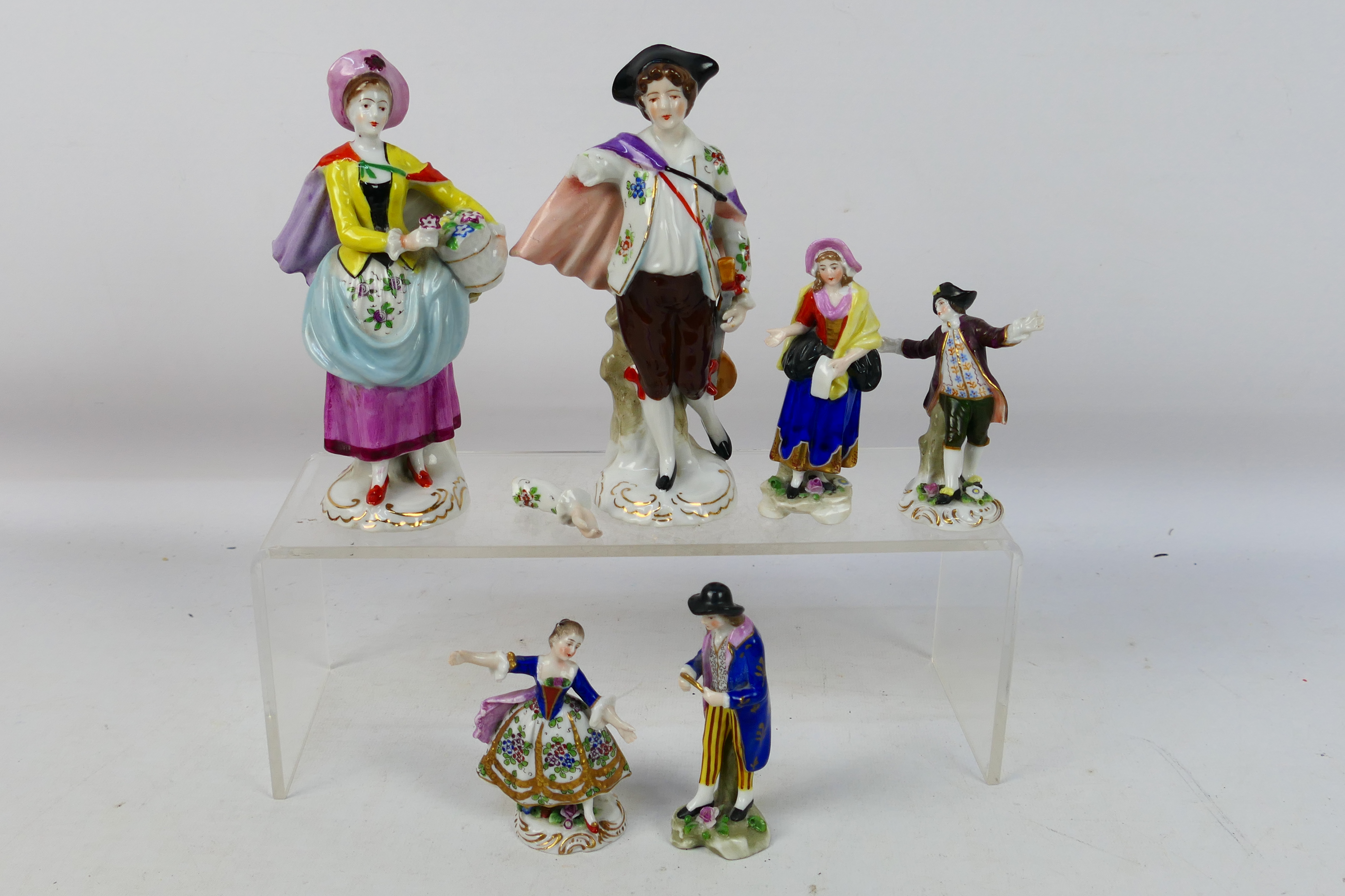A collection of continental porcelain figures, largest approximately 16 cm (h).
