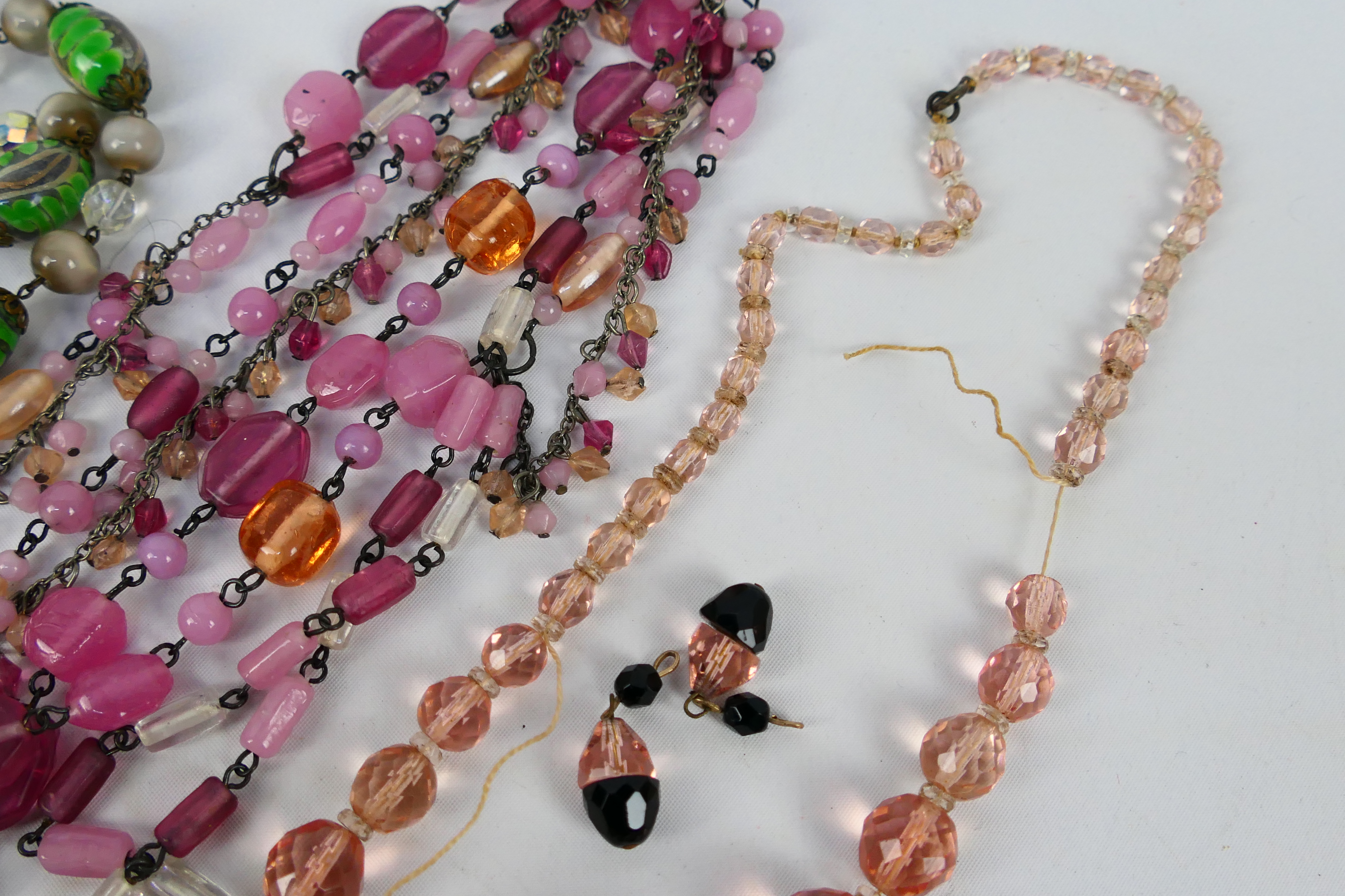Three decorative costume jewellery necklaces and a pair of earrings. - Image 5 of 6
