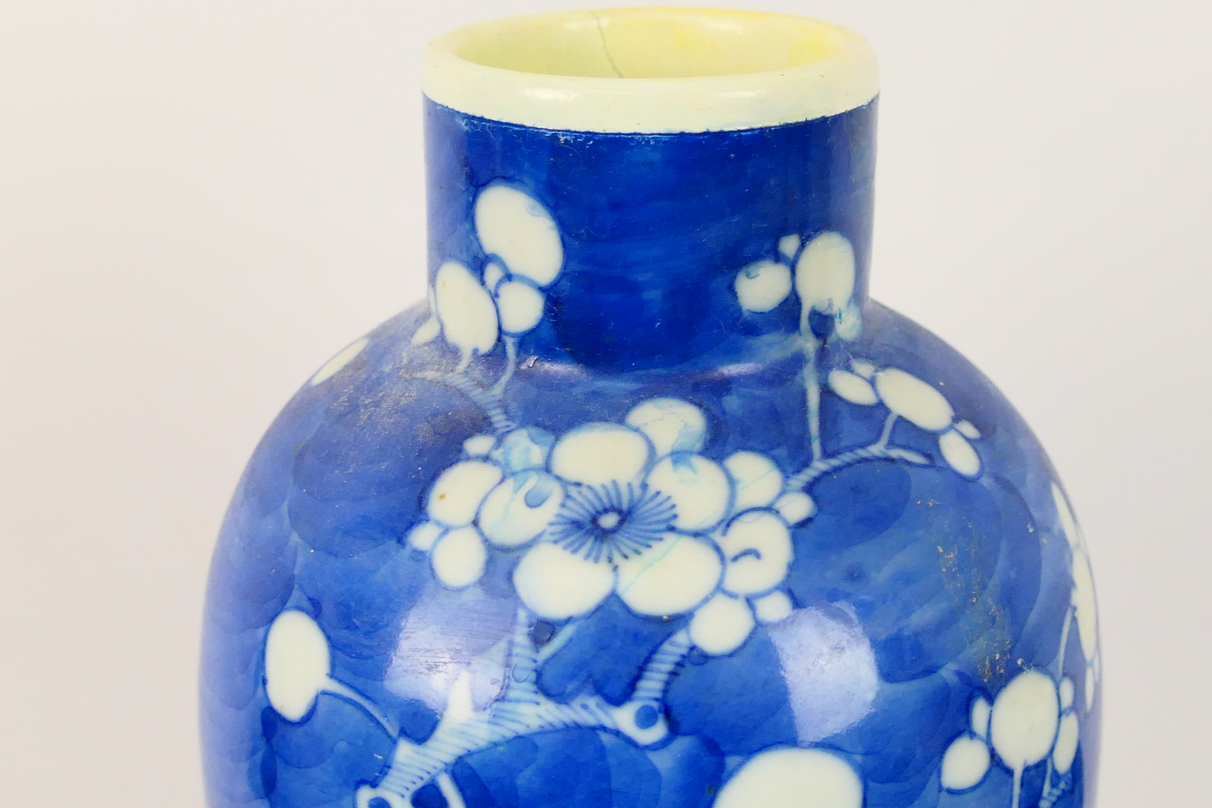 A Chinese blue and white jar and cover, decorated with prunus, - Image 9 of 23