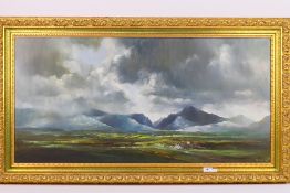 David Weston (1935 - 2011) - A framed oil on canvas landscape scene depicting cottages on a