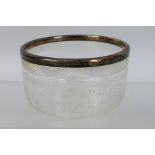 A small crystal glass bowl with sterling silver rim. Makers marked J.G and S. 5 cm (h).