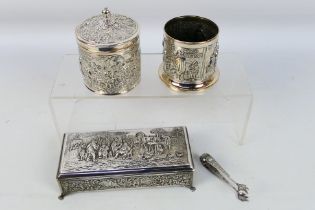 Three pieces of Dutch silverplate comprising cigarette box,