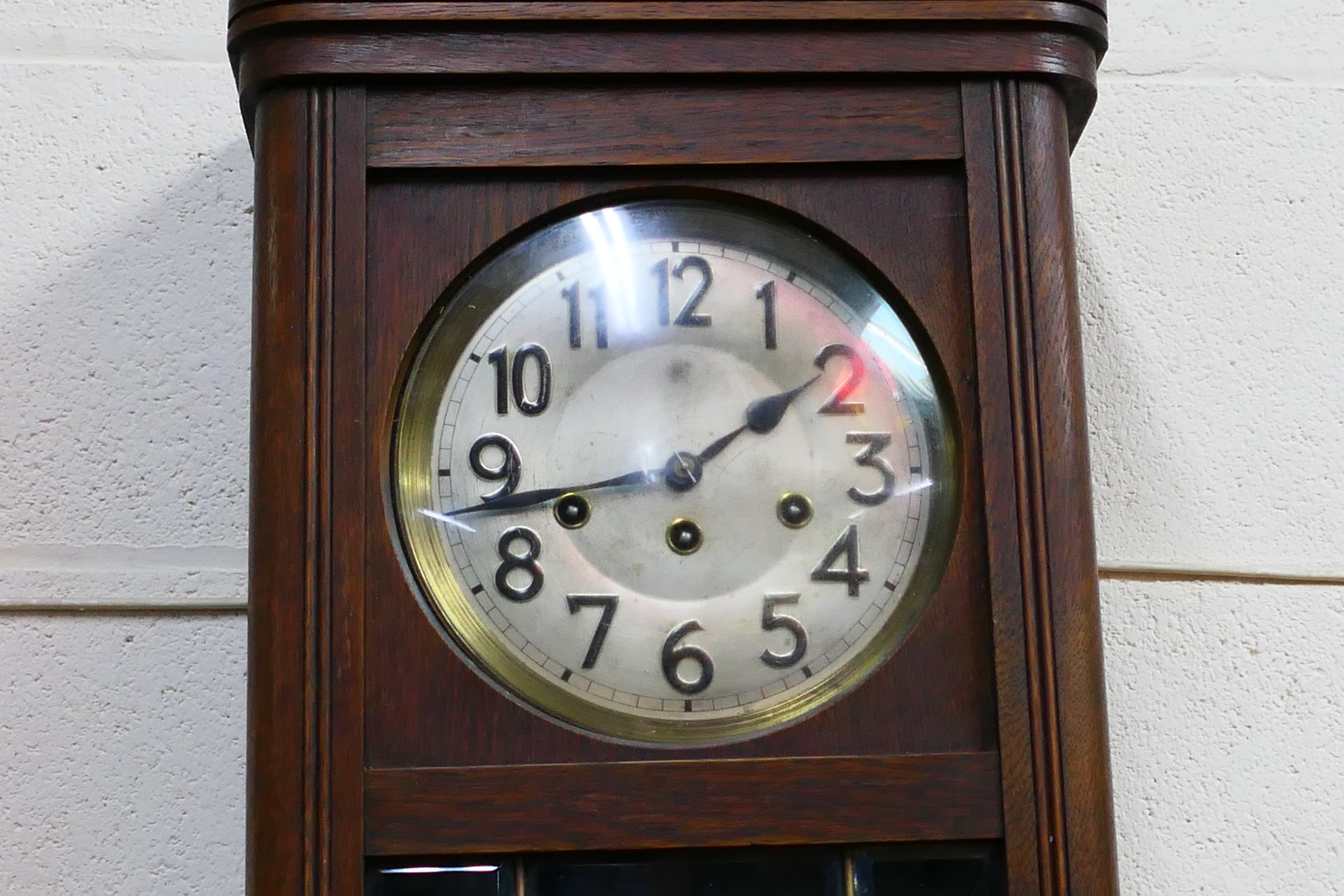 An oak cased wall clock, Arabic numerals to the dial, with pendulum. - Image 3 of 4