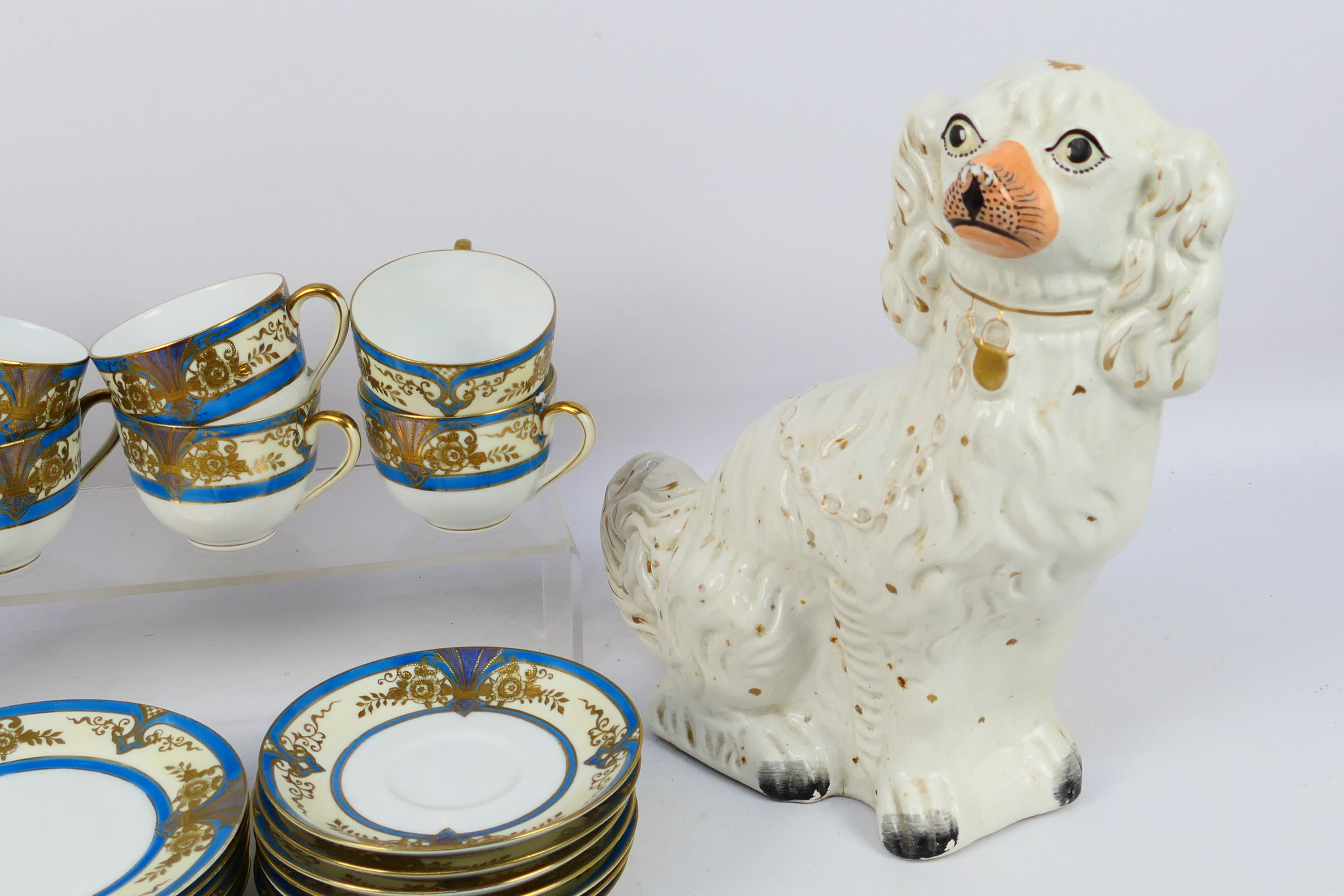 A pair of Staffordshire dogs in white and gilt, - Image 2 of 10