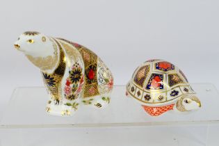 Royal Crown Derby - Two paperweights comprising Old Imari Polar Bear (silver stopper) and Tortoise,