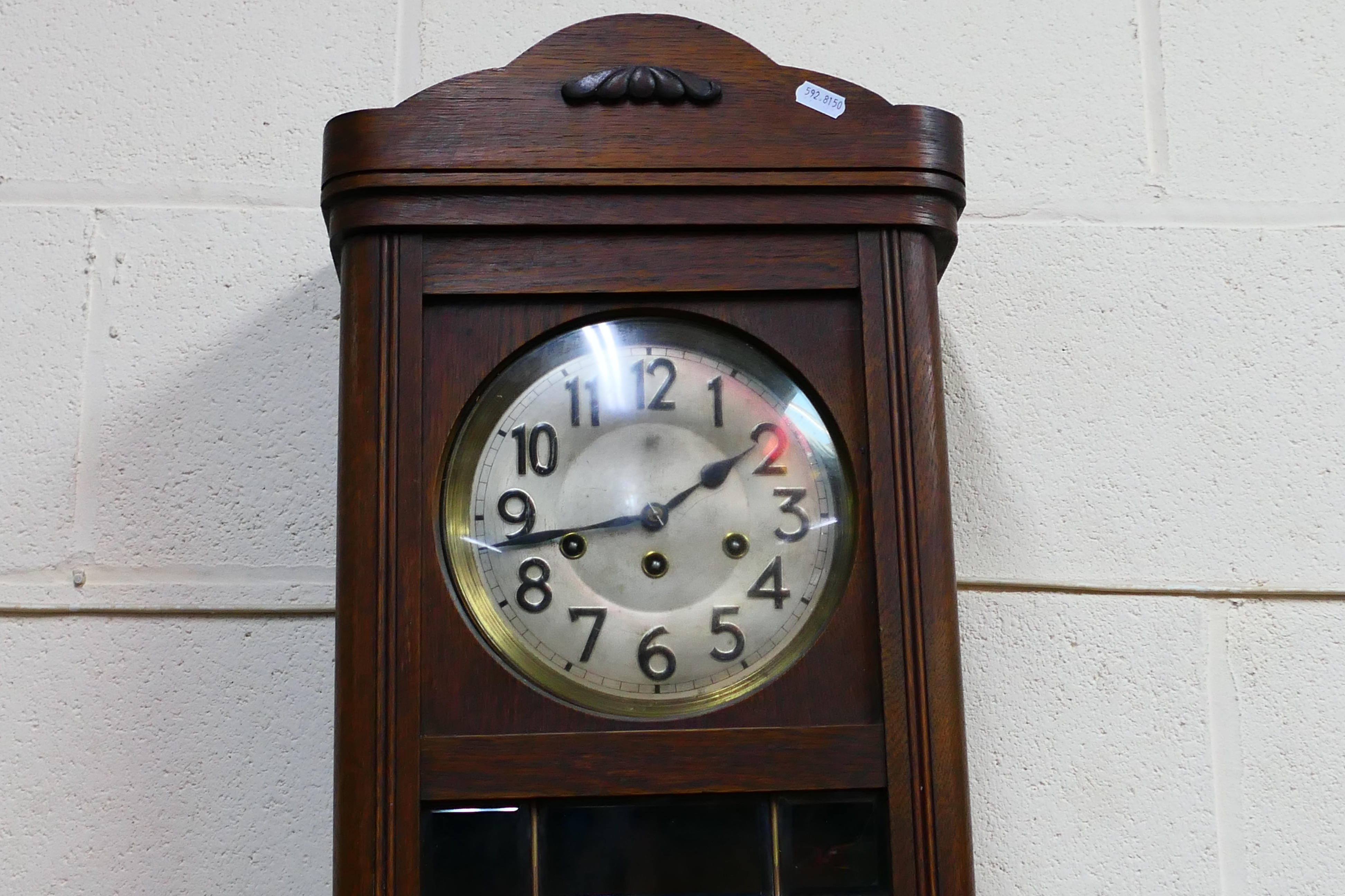 An oak cased wall clock, Arabic numerals to the dial, with pendulum. - Image 2 of 4