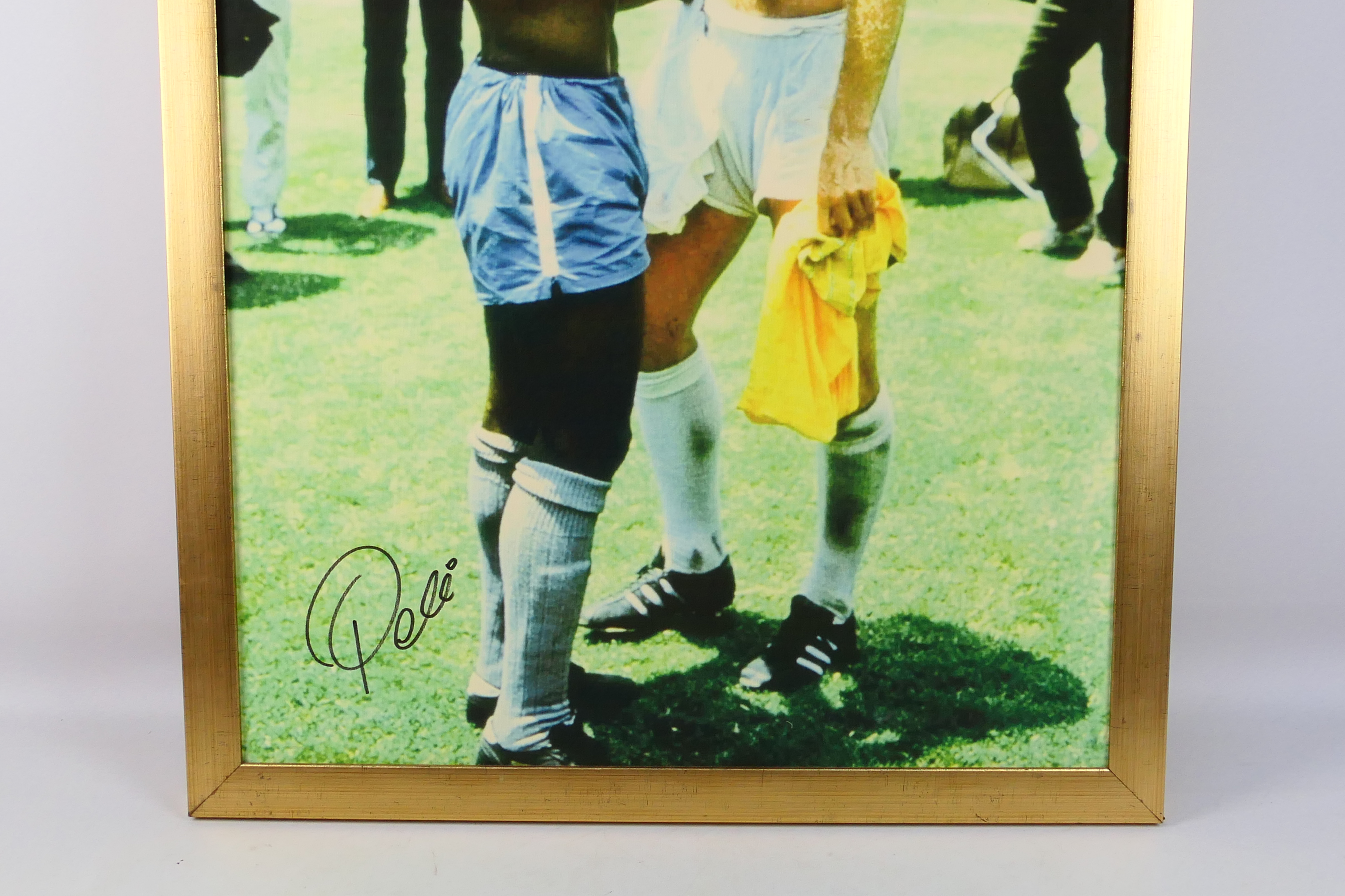A Reproduction Canvas Print of Pele and Bobby Moore, hand signed by Pele, framed, 88cm by 61cm, - Image 3 of 5
