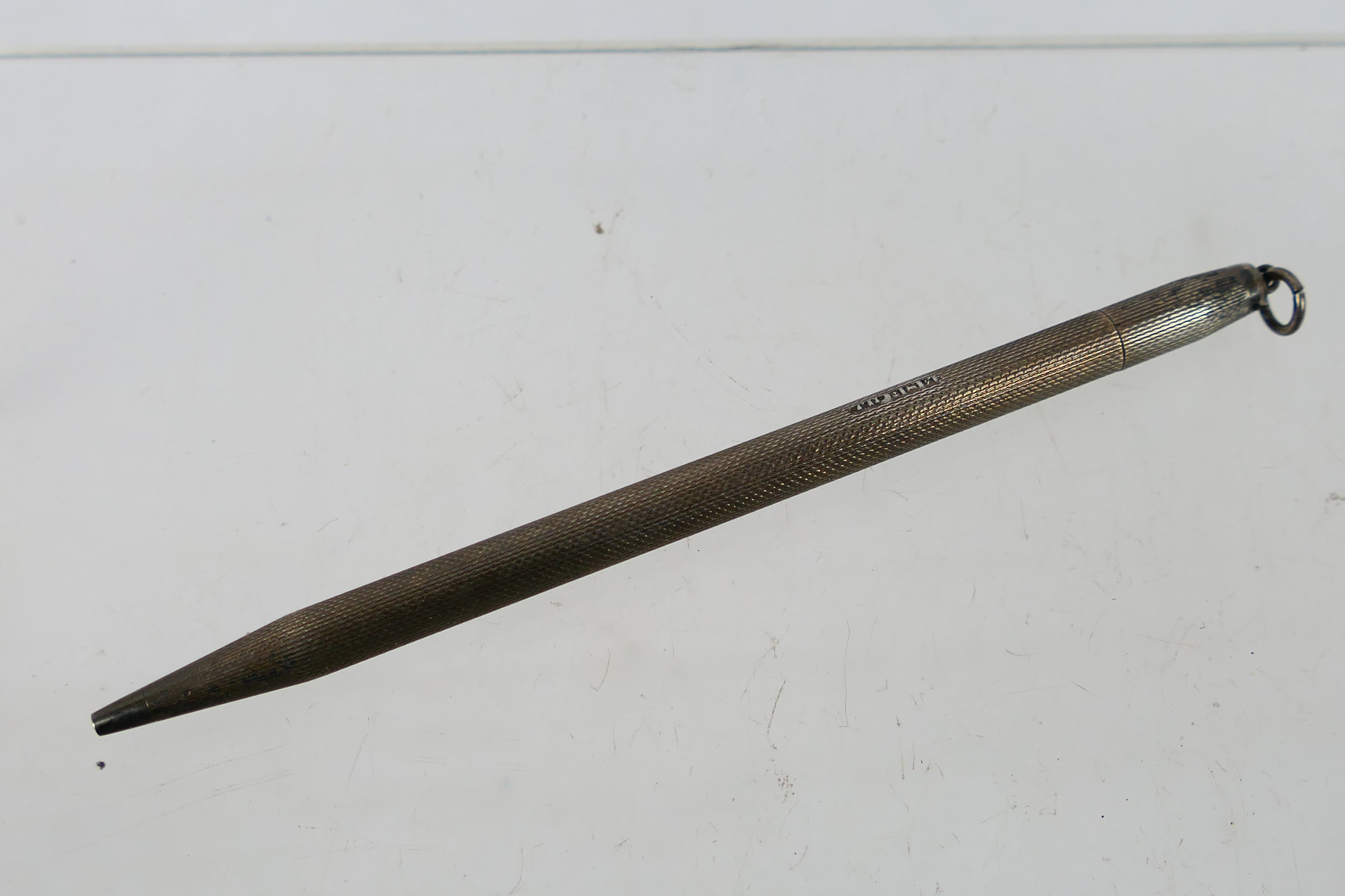 A silver mechanical pencil, Birmingham assay 1956.