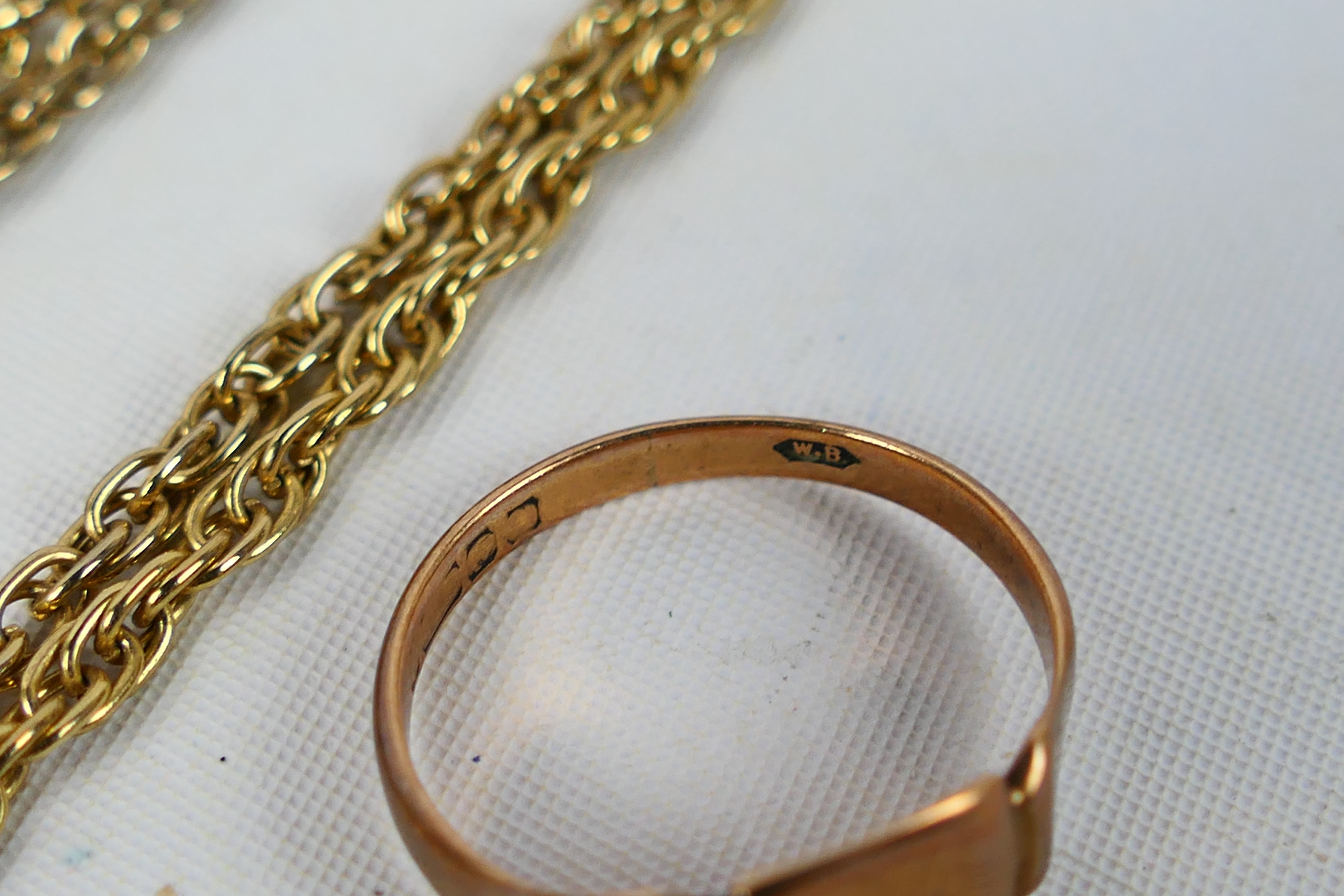 A rose gold ring (hallmarks very rubbed but presumed 9ct) and an unmarked yellow metal chain, - Image 5 of 5