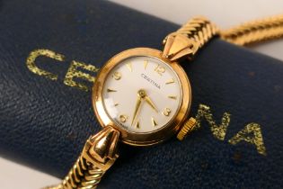 A lady's 9ct gold cased Certina wrist watch on 9ct gold bracelet, approximately 15.