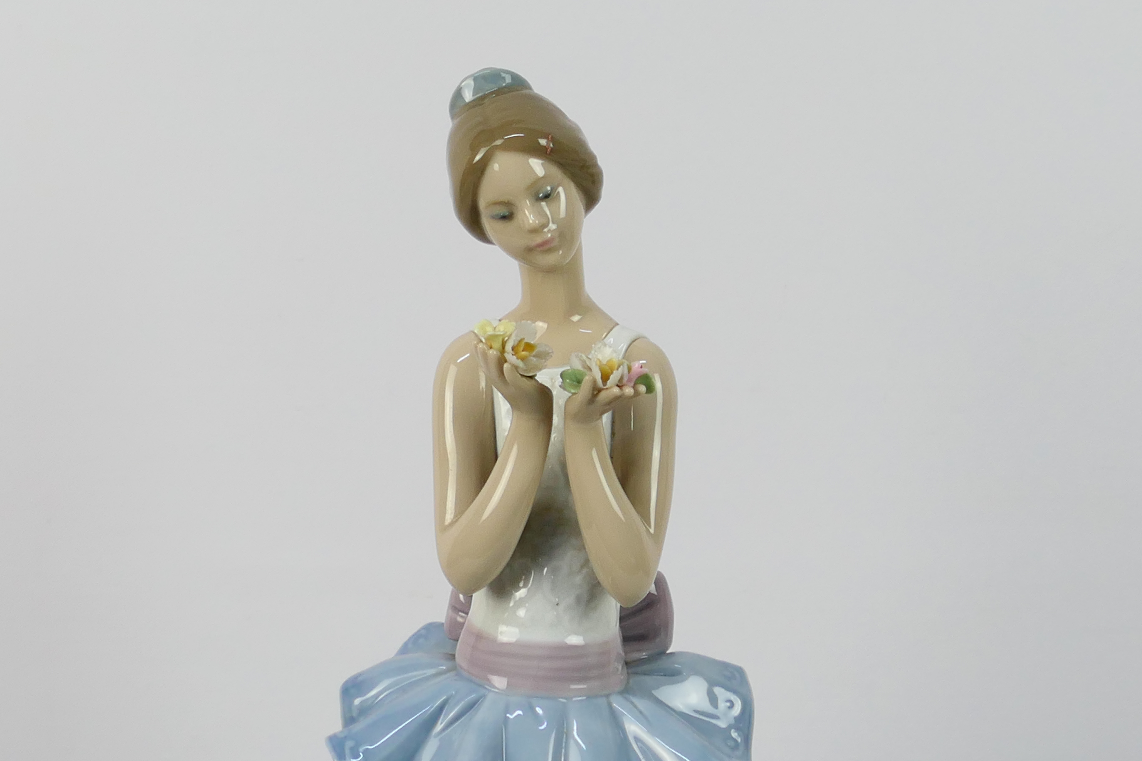 A large Lladro figure, # 6592, An Expression Of Love, depicting a young lady holding flowers, - Image 2 of 6