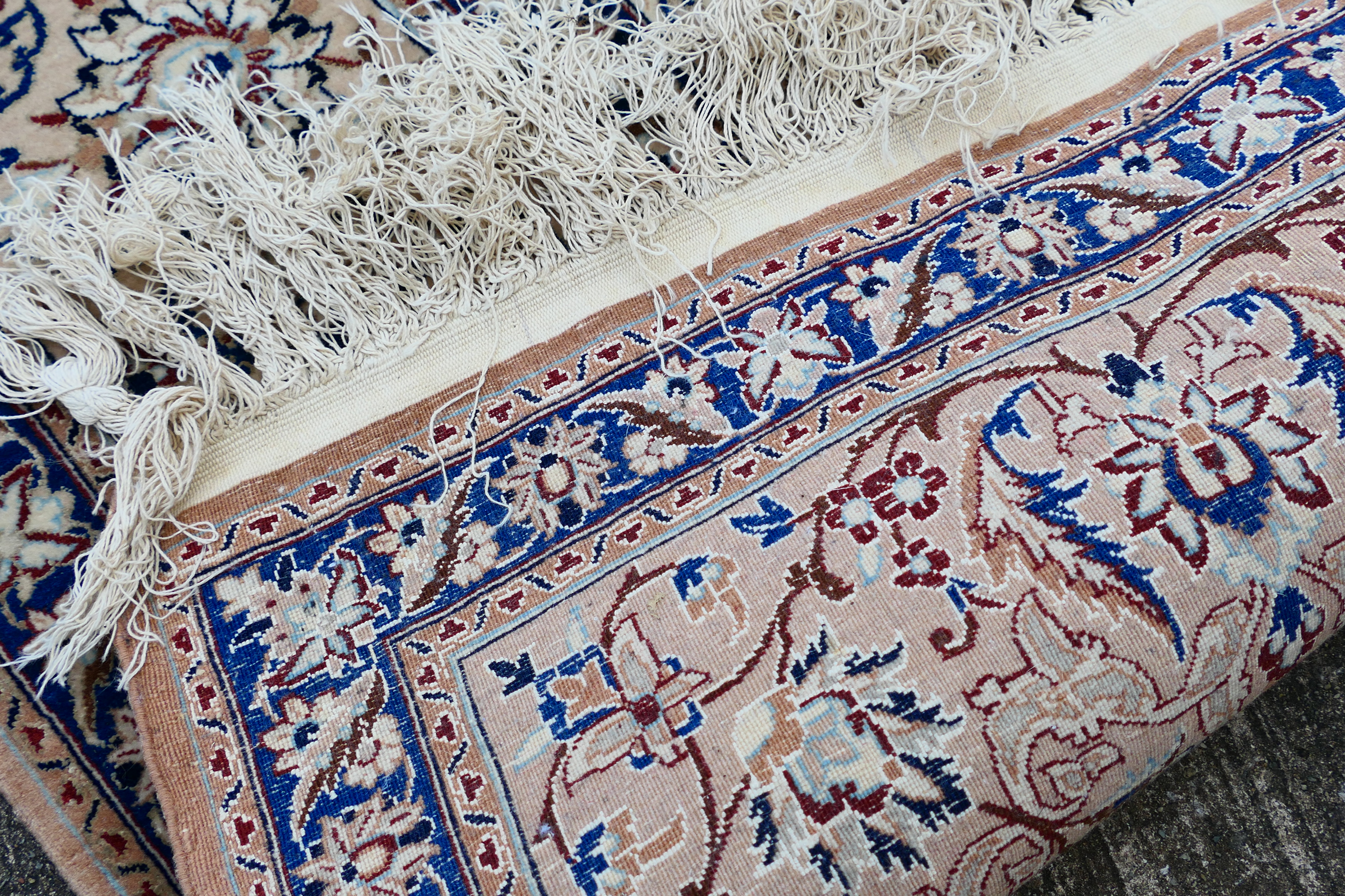 A Persian ivory ground rug with central medallion on a floral field, with foliage scroll border, - Image 5 of 14