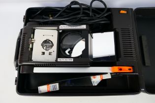 An Anders & Kern Portable 300 overhead projector in carry case.