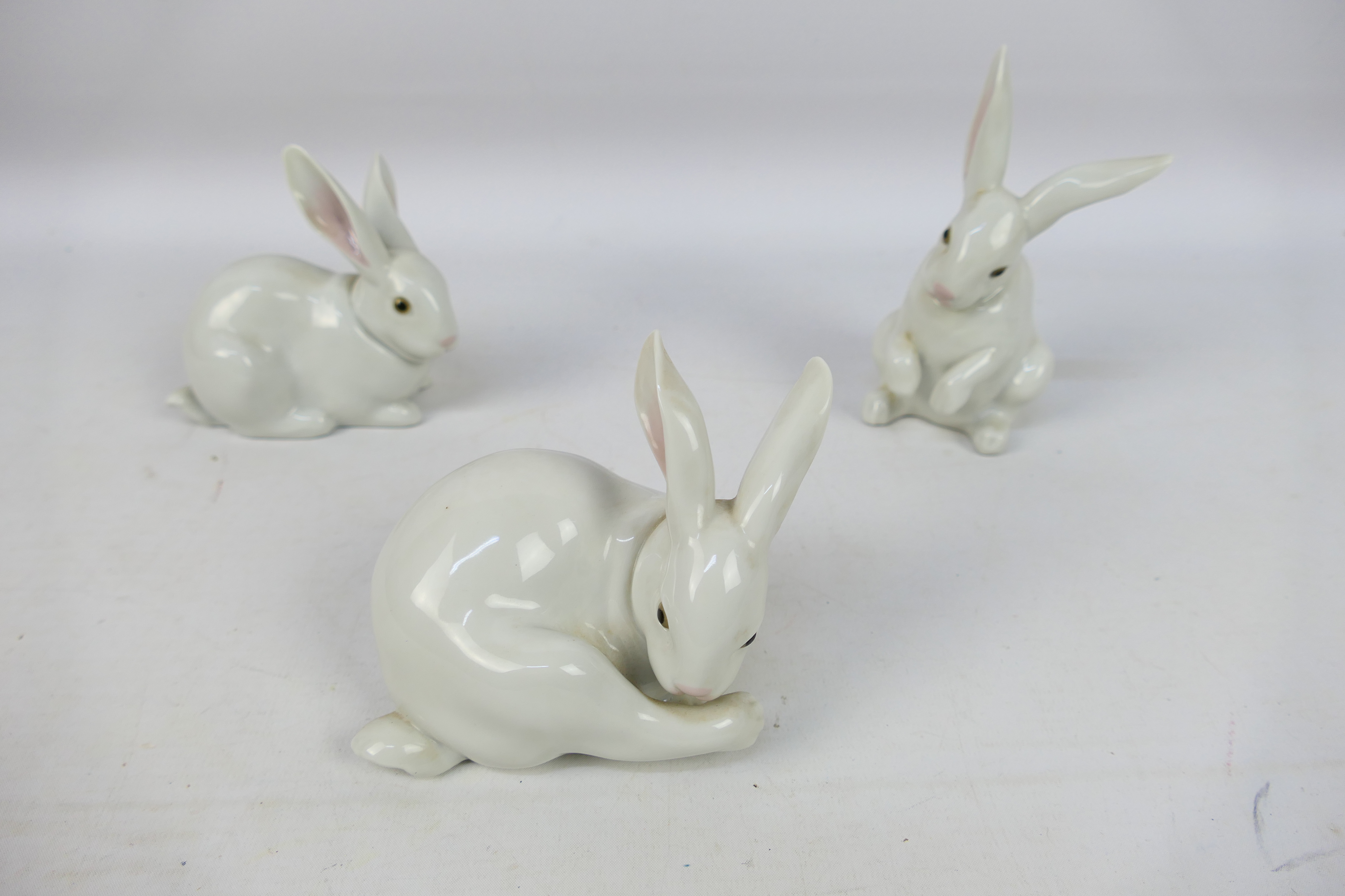 Three Lladro rabbit figures comprising # 5905 Attentive Bunny,